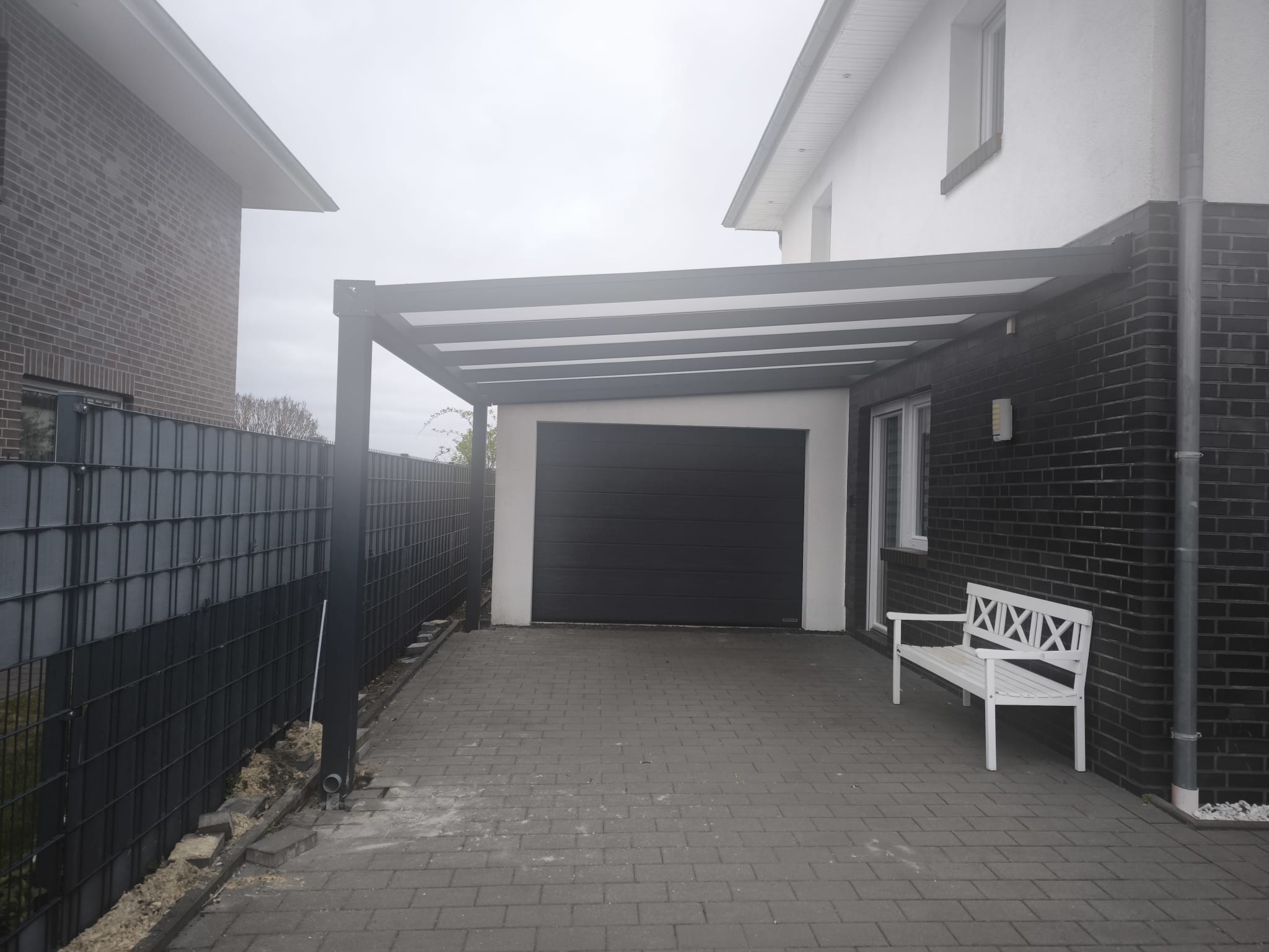 Carport mit Sitzbank – Carport in Vechta (2025) | Referenz Nickel-Terrassen